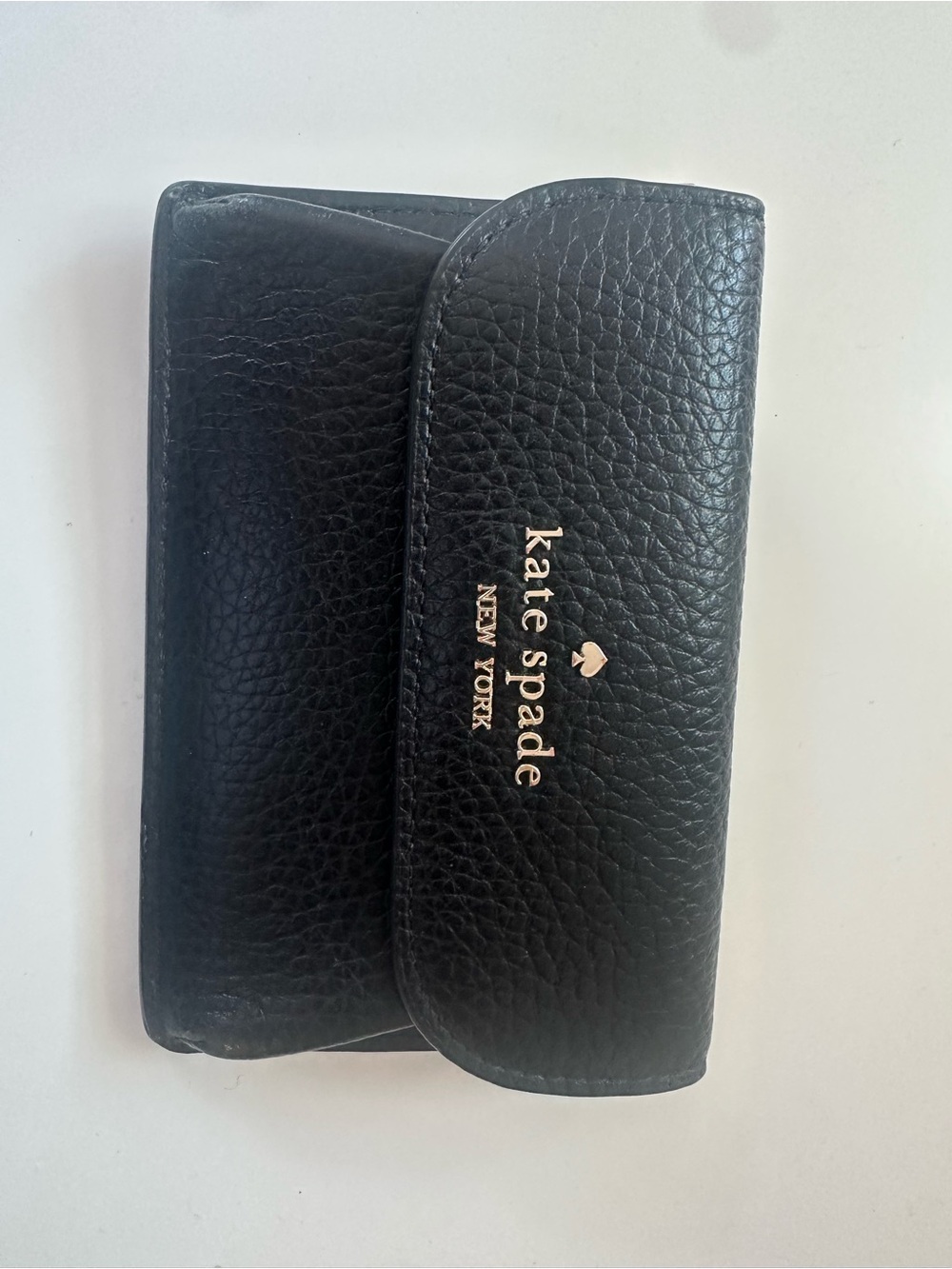 kate spade black pebbled leather card wallet with gold logo